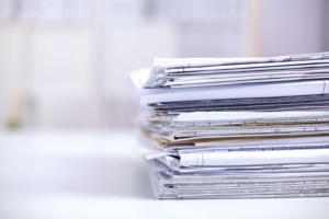 Big stack of papers ,documents on the desk .